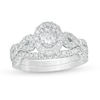 Thumbnail Image 0 of Previously Owned - 1 CT. T.W. Oval Diamond Frame Collar Bridal Set in 14K White Gold (I/I2)