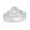 Thumbnail Image 1 of Previously Owned - 1 CT. T.W. Oval Diamond Frame Collar Bridal Set in 14K White Gold (I/I2)
