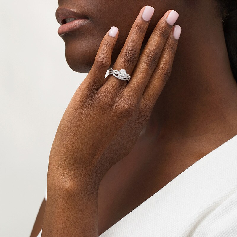 Main Image 2 of Previously Owned - 1 CT. T.W. Oval Diamond Frame Collar Bridal Set in 14K White Gold (I/I2)