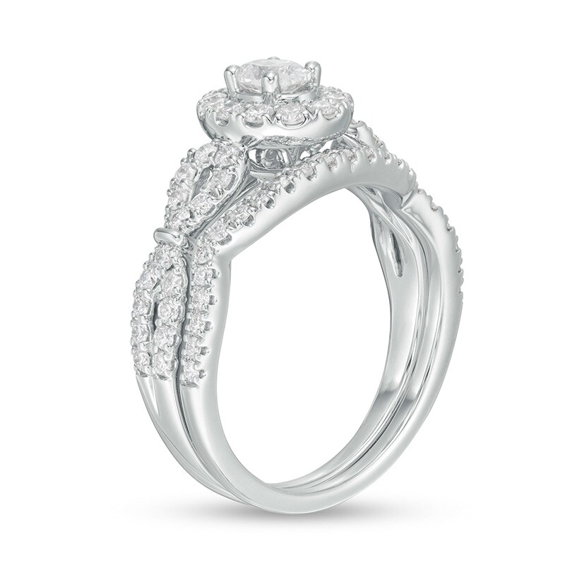 Main Image 3 of Previously Owned - 1 CT. T.W. Oval Diamond Frame Collar Bridal Set in 14K White Gold (I/I2)
