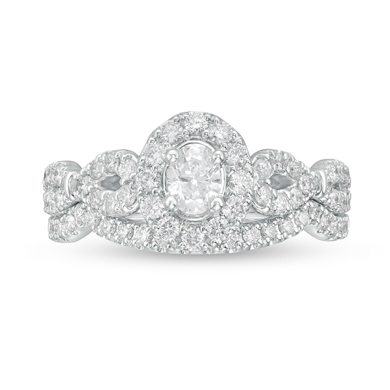 Previously Owned - 1 CT. T.W. Oval Diamond Frame Collar Bridal Set in 14K White Gold (I/I2)