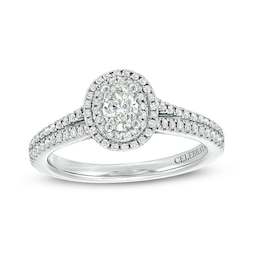 Previously Owned - Celebration Infinite™ 3/4 CT. T.W. Oval Diamond Frame Split Shank Engagement Ring in 14K White Gold