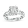 Thumbnail Image 1 of Previously Owned - 3/4 CT. T.W. Emerald-Shaped Multi-Diamond Frame Bridal Set in 10K White Gold (I/SI2)