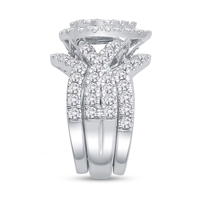 Previously Owned - 2 CT. T.W. Pear-Shaped Multi-Diamond Three Piece Bridal Set in 14K White Gold