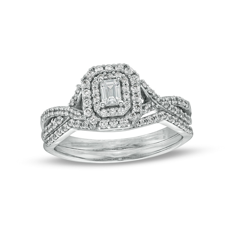 Main Image 1 of Previously Owned - 5/8 CT. T.W. Emerald-Cut Diamond Frame Bridal Set in 10K White Gold (I/I1)
