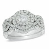 Thumbnail Image 1 of Previously Owned - 1-1/5 CT. T.W. Diamond Cluster Bridal Set in 14K White Gold