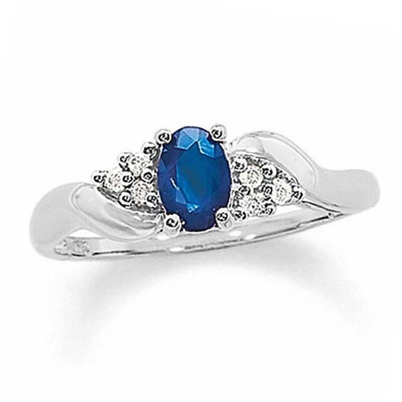 Main Image 1 of Previously Owned - Oval Blue Sapphire and 1/20 CT. T.W. Diamond Twist Ring in 10K White Gold
