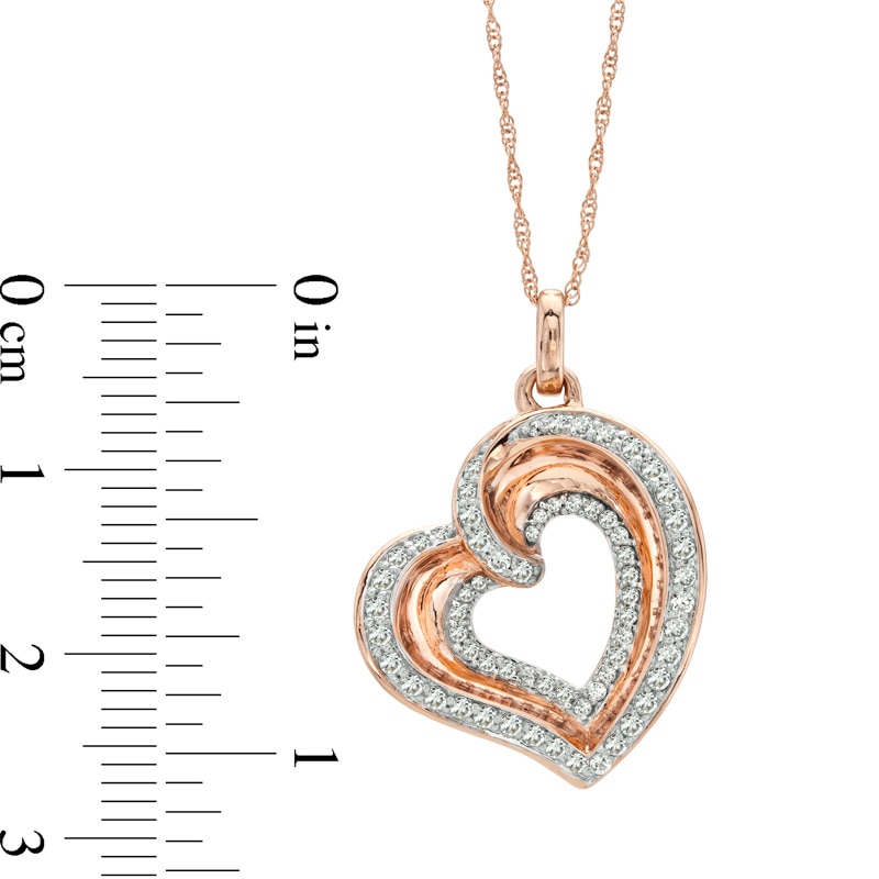 Previously Owned - The Heart Within® 1/2 CT. T.W. Diamond Tilted Heart Pendant in 10K Rose Gold