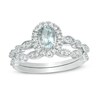 Thumbnail Image 1 of Previously Owned - Oval Aquamarine and 1/5 CT. T.W. Diamond Frame Vintage-Style Bridal Set in 10K White Gold
