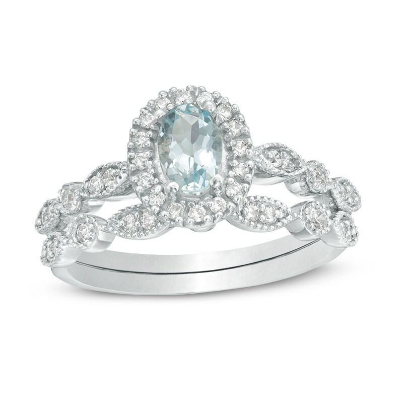Main Image 1 of Previously Owned - Oval Aquamarine and 1/5 CT. T.W. Diamond Frame Vintage-Style Bridal Set in 10K White Gold
