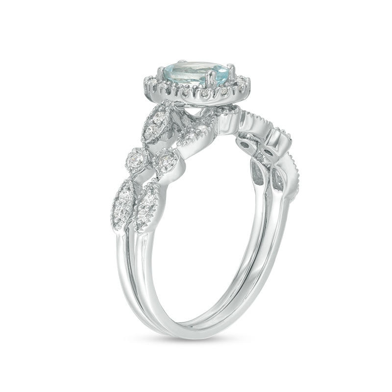 Main Image 3 of Previously Owned - Oval Aquamarine and 1/5 CT. T.W. Diamond Frame Vintage-Style Bridal Set in 10K White Gold