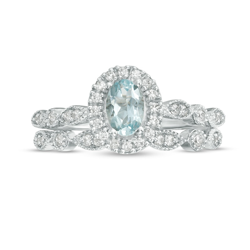 Main Image 4 of Previously Owned - Oval Aquamarine and 1/5 CT. T.W. Diamond Frame Vintage-Style Bridal Set in 10K White Gold