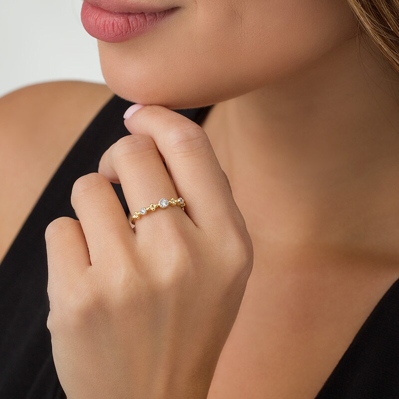 Main Image 3 of Previously Owned - 1/15 CT. T.W. Diamond Three Stone Beaded Band in 10K Gold