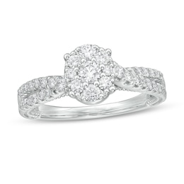 Previously Owned - 5/8 CT. T.W. Composite Oval Diamond Crossover Shank Engagement Ring in 14K White Gold