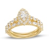 Thumbnail Image 1 of Previously Owned - 1-1/2 CT. T.W. Marquise Diamond Frame Alternating Shank Bridal Set in 14K Gold (I/I1)