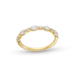 Previously Owned - 5/8 CT. T.W. Oval and Round Diamond Alternating Anniversary Band in 14K Gold (I/SI2)