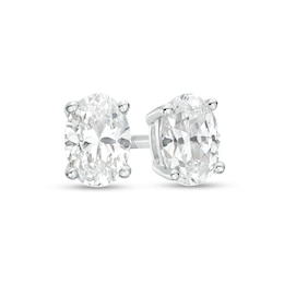 Previously Owned - 1/2 CT. T.W. Oval Lab-Grown Diamond Solitaire Stud Earrings in 14K White Gold (F/SI2)