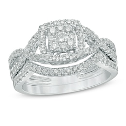 Previously Owned - 5/8 CT. T.W. Composite Diamond Frame Twist Shank Bridal Set in 10K White Gold