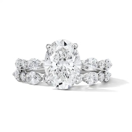 Previously Owned - Romantic Bouquet 4 CT. T.W. Oval Lab-Grown Diamond Bridal Set in 14K White Gold (F/VS2)