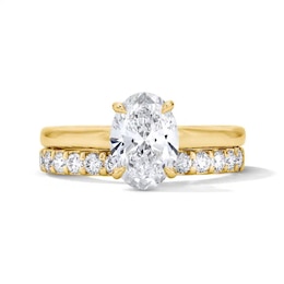 Previously Owned - 2 CT. T.W. Oval Lab-Grown Diamond Hidden Frame Bridal Set in 14K Gold (F/VS2)