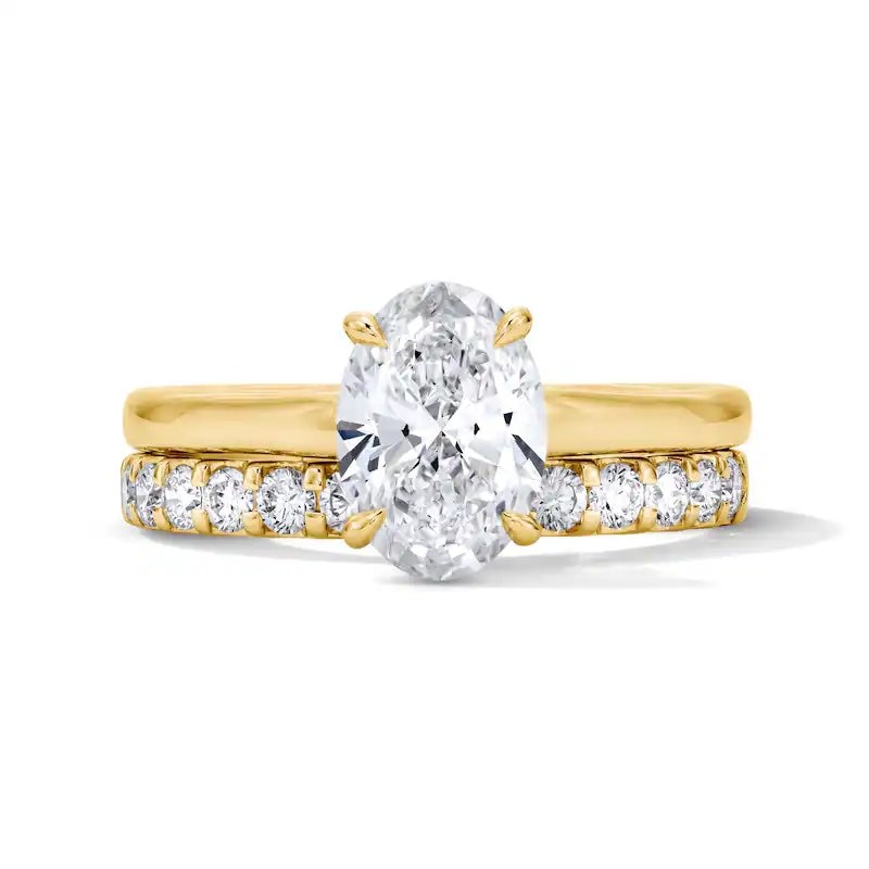 Main Image 1 of Previously Owned - 2 CT. T.W. Oval Lab-Grown Diamond Hidden Frame Bridal Set in 14K Gold (F/VS2)