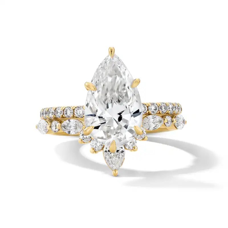 Main Image 1 of Previously Owned - 4 CT. T.W. Pear-Shaped Lab-Grown Diamond Bridal Set in 14K Gold (F/VS2)