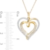 Thumbnail Image 2 of 1/2 CT. T.W. Baguette and Round Diamond Double Swirl Heart Pendant in 10K Gold